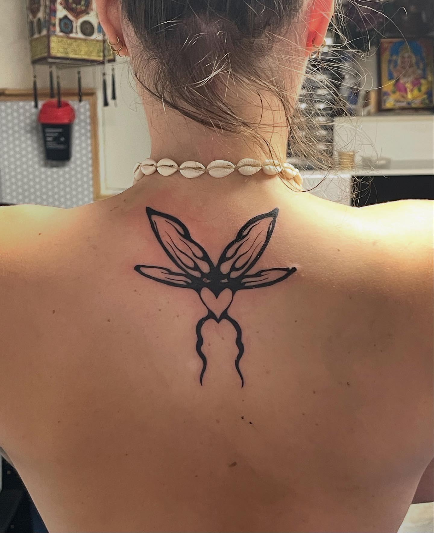 Tatouage réalisé par Blukirin